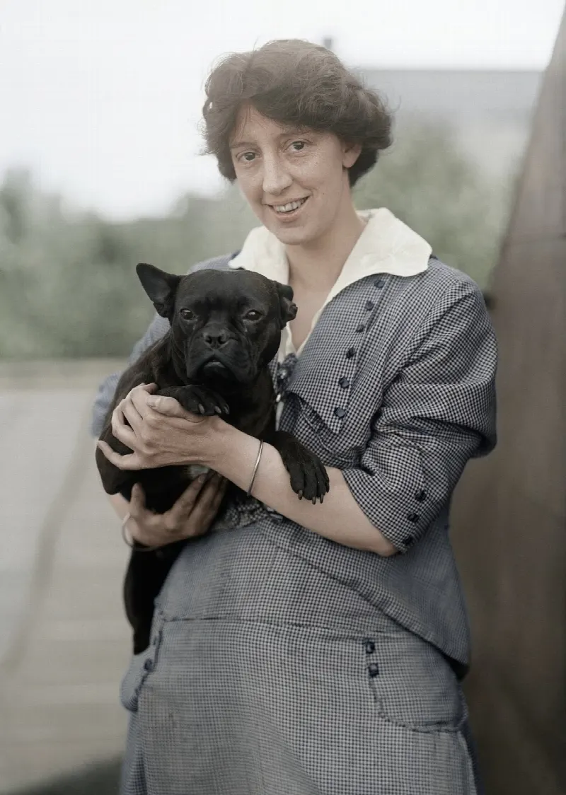After – Woman with her dog, 1915 · public domain (Library of Congress)